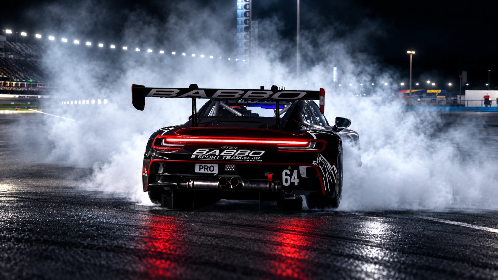 Babbo Porsche 911 GT3 R mit der Nummer 64 bei Nacht, mit Reifenqualm